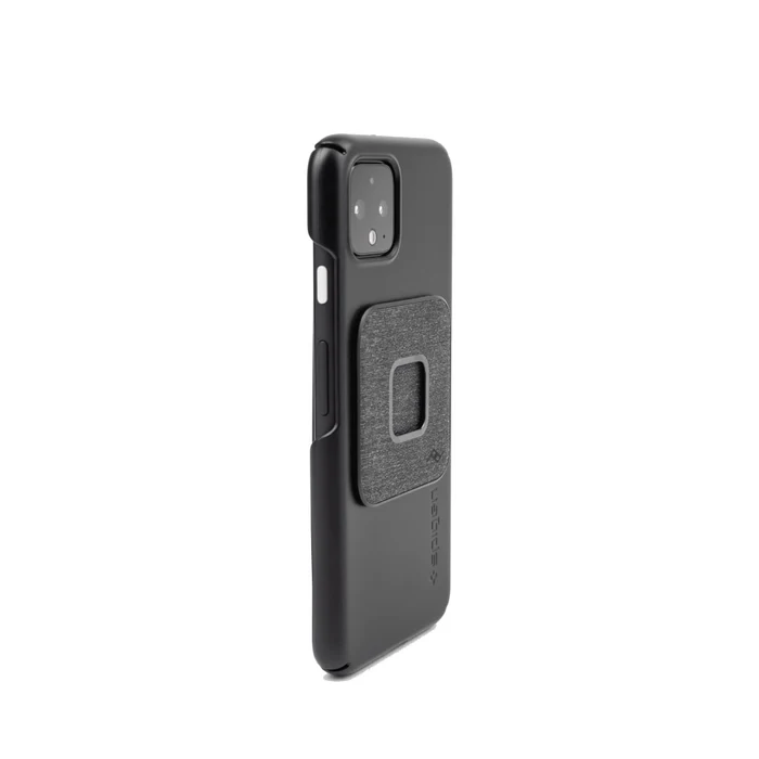 Peak Design Universal Adapter in Charcoal attached to a black phone case