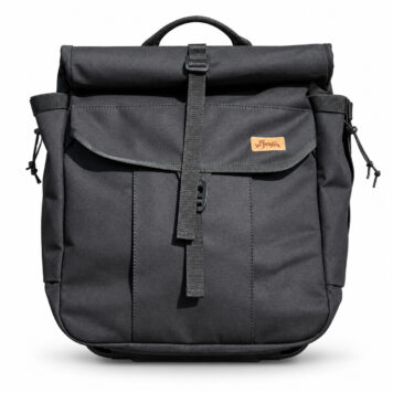 La Jefa & Sons Bropack Black roll-top backpack on a white background