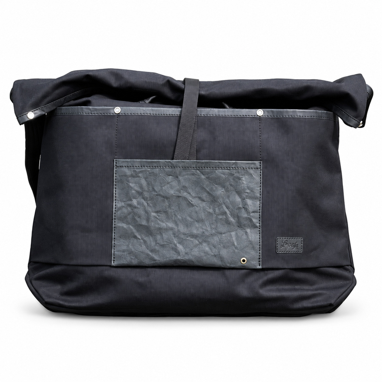 Black La Jefa & Sons CORDURA shopping tote on a white background, showing its front pocket and folded top