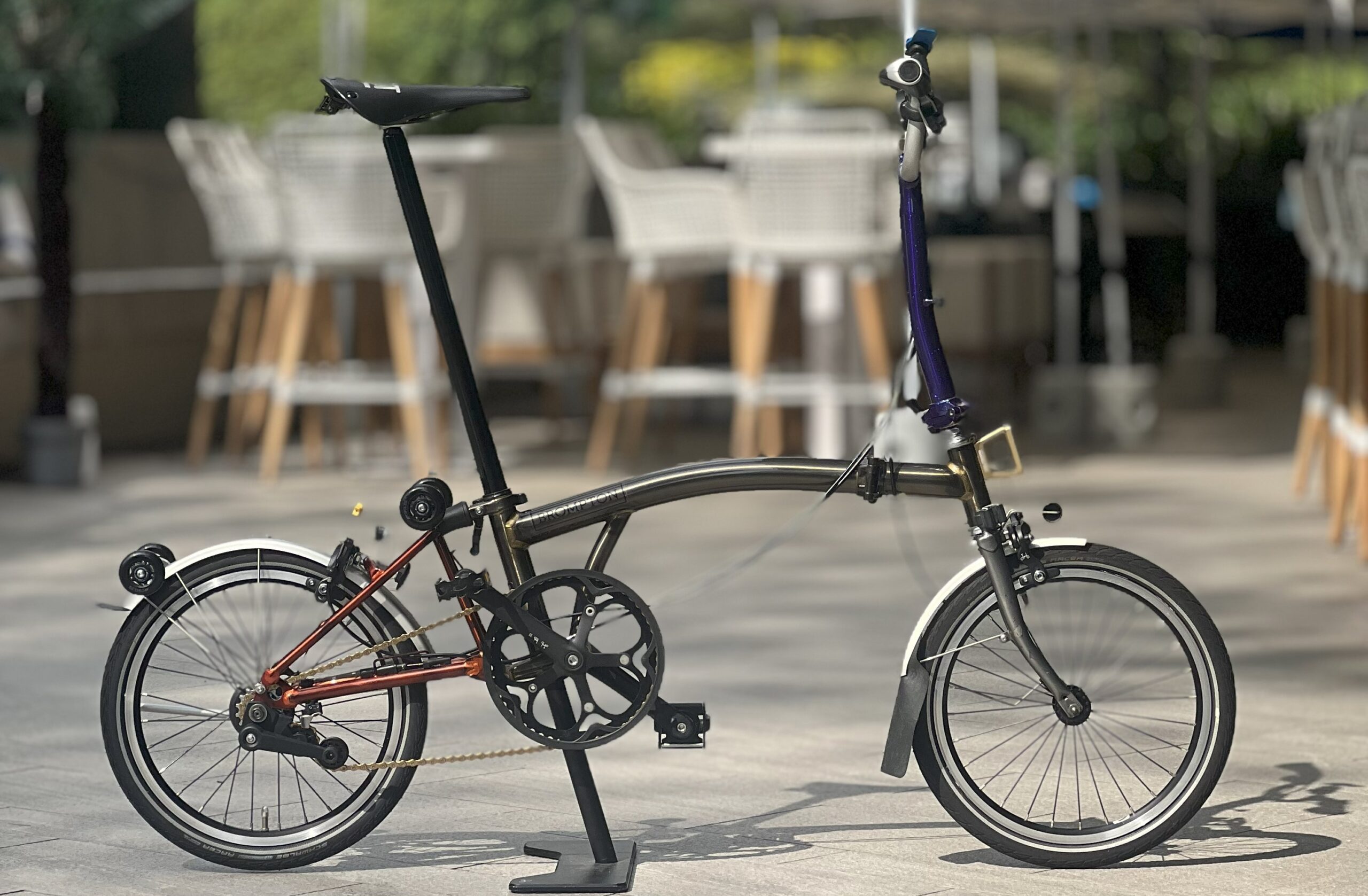 Multi-coloured Brompton C Line M2L Black Lacquer rental bike