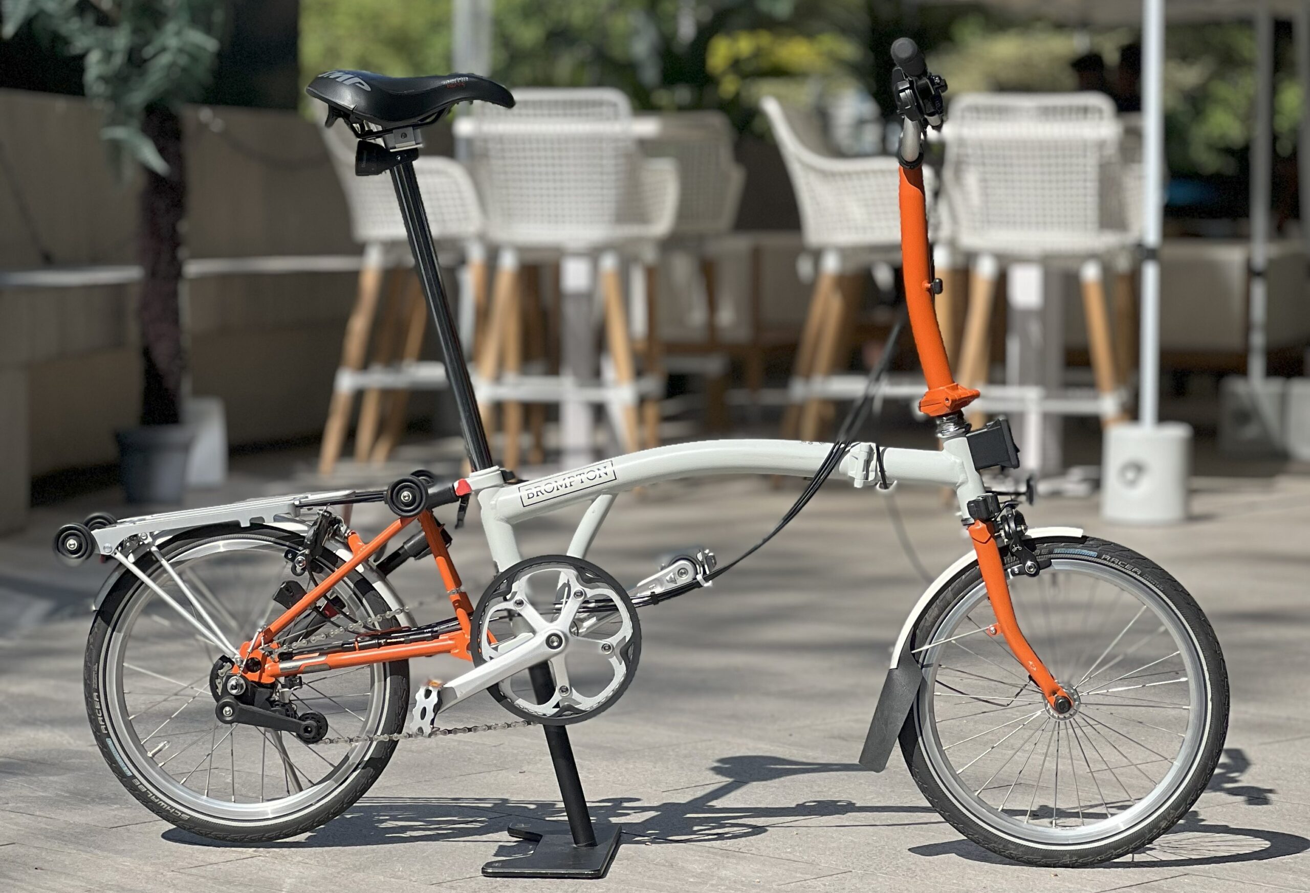 Brompton C Line M6R Papyrus White and Orange rental bike in Singapore