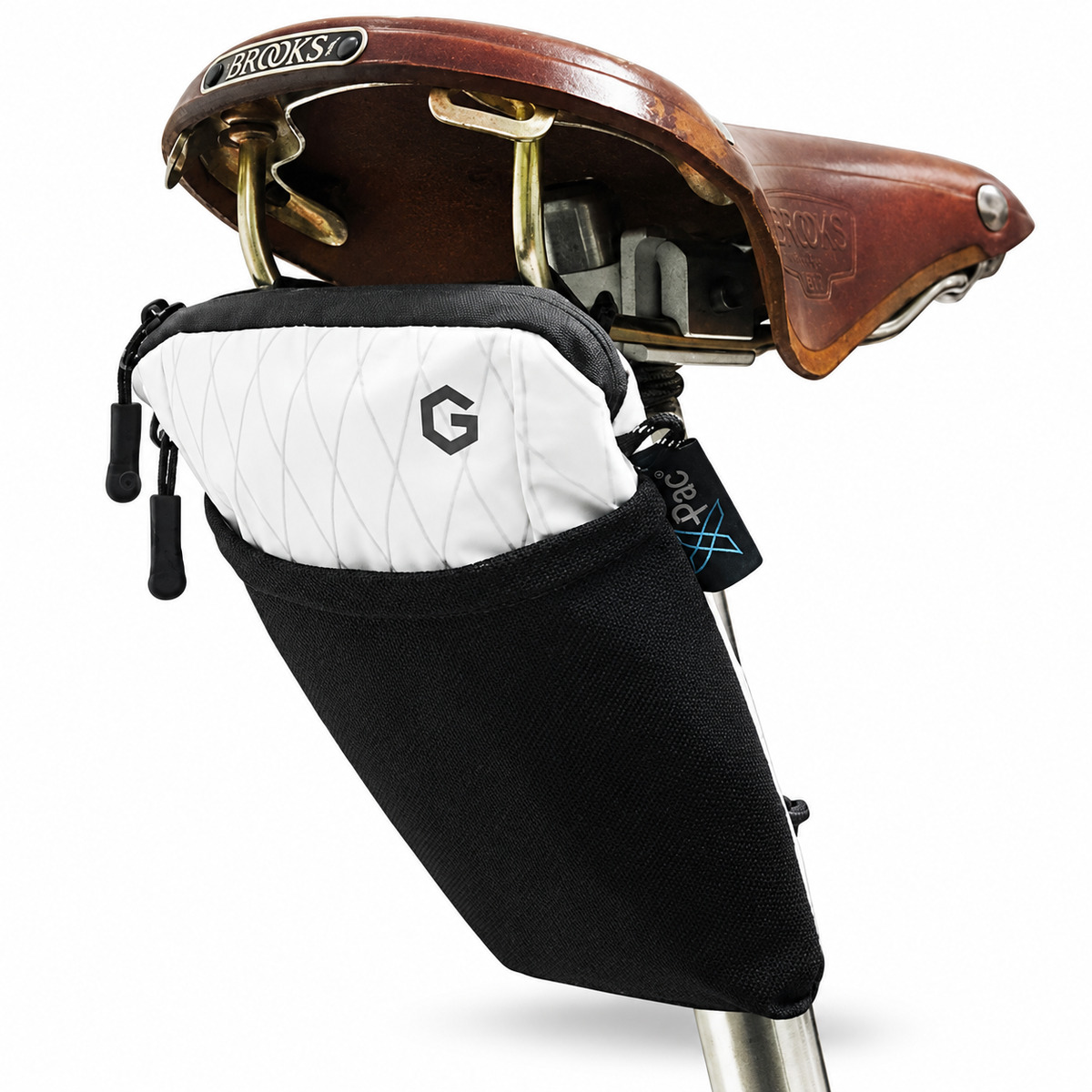 Hexa.Go Ultra Light Saddle Bag for Brompton in white mounted beneath a Brooks saddle