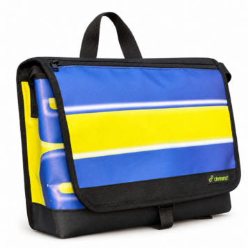 Demano Arago 1711 Brompton medium front bag with a yellow stripe and white outlines across blue-purple panels, black trim and sewn Demano label, isolated on white.