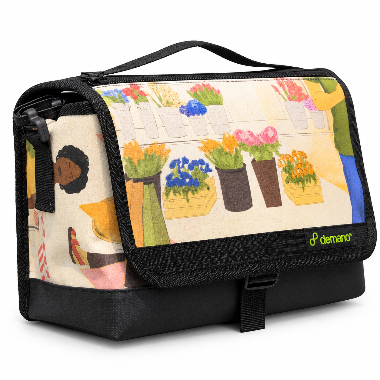 Demano Ribera 1708 Brompton mini front bag with a multicoloured flower-market illustration on cream canvas and black trim, isolated on white.