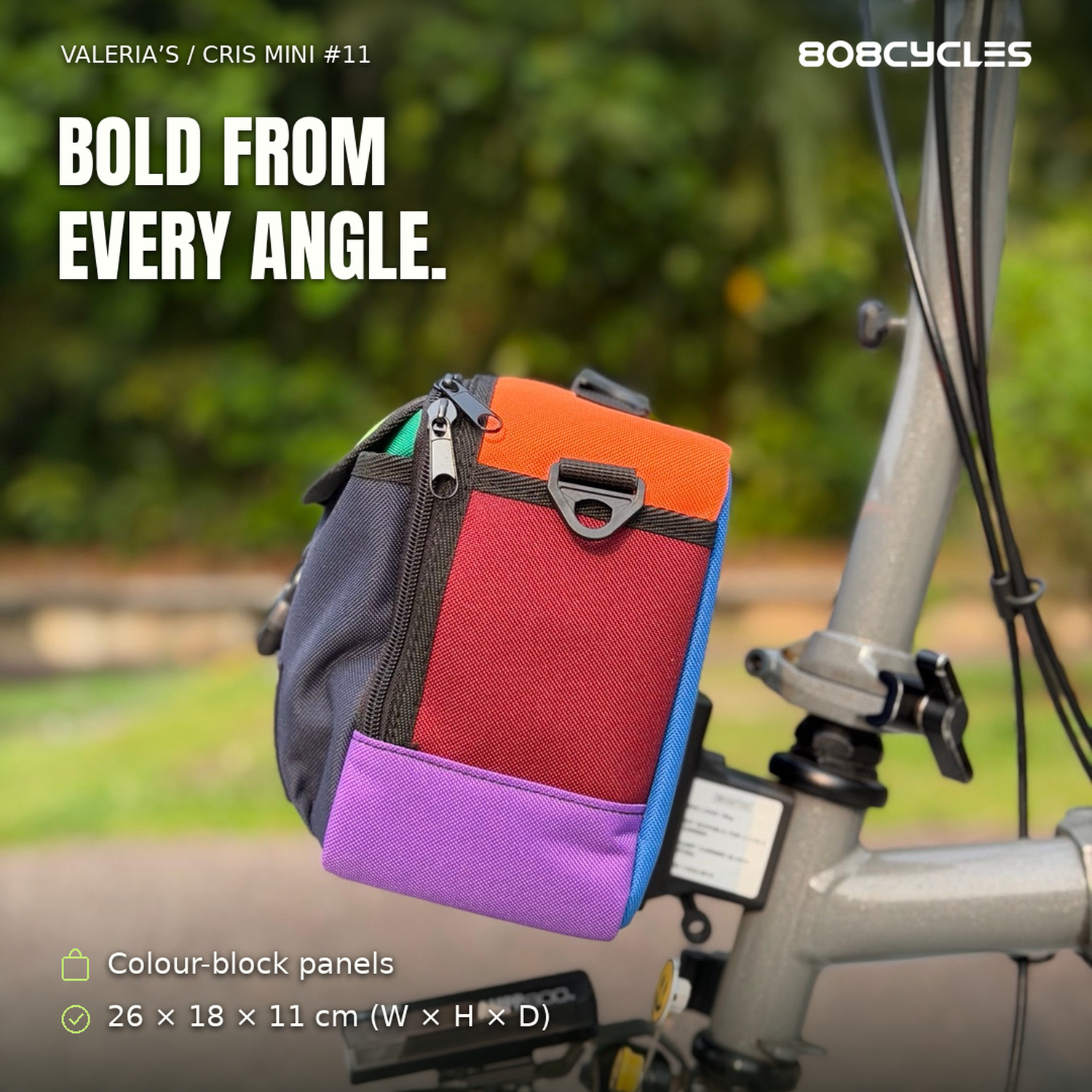 Feature graphic: Side view of Cris Mini #11 showing burgundy side panel, orange top and purple base